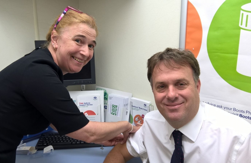 Julian Sturdy receiving his flu jab at Boots Pharmacy in Haxby